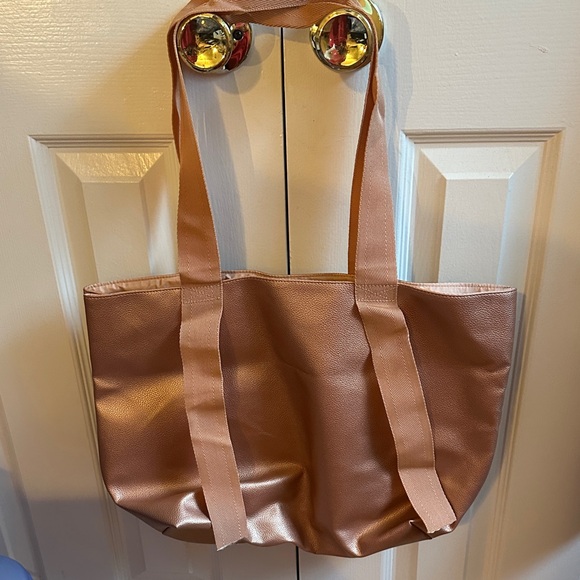 Saks Fifth Avenue Handbags - Women's Saks Fifth Avenue Pebble Rose Gold Tote bag .